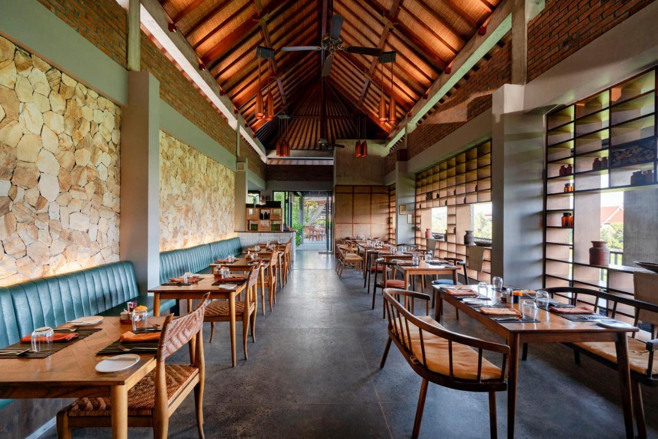 Hotel Bisma Eight - Chse Certified Ubud Exterior foto The restaurant at the resort